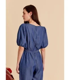Blauwe jumpsuit met strik aan de taille en korte pofmouwen