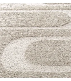 Hoogpolig vloerkleed met taupe geometrisch patroon 120 x 170 cm