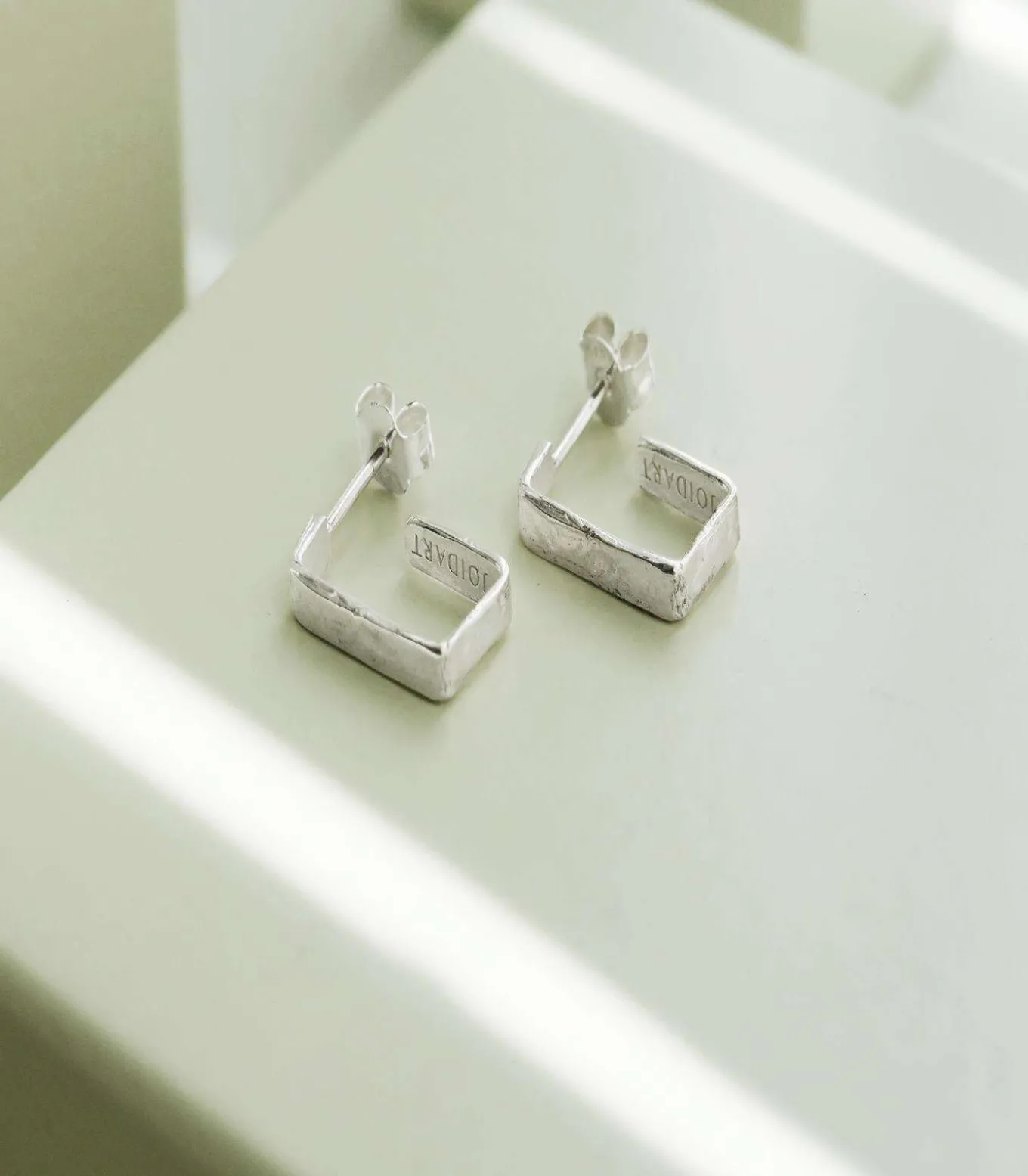 Kleine zilveren oorbellen Lignis fijn