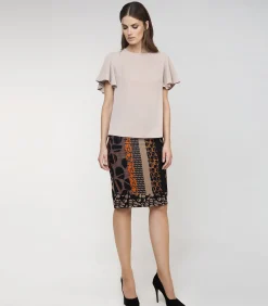 Kokerrok met print van Conquista