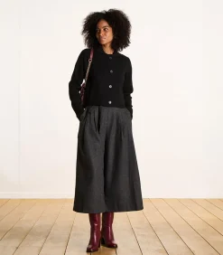 Korte zwarte gilet in gebreide stof met overhemdkraag