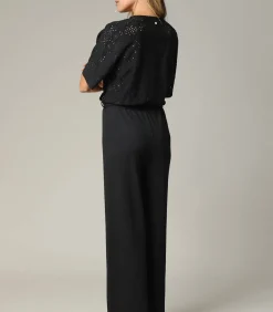 TAYLA - Zwarte crossover-jumpsuit voor dames met mooie mesh