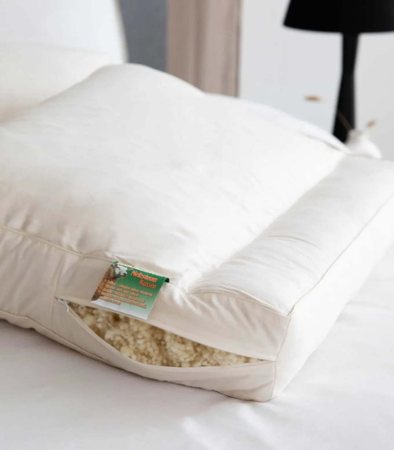 Wollen Neksteunkussen